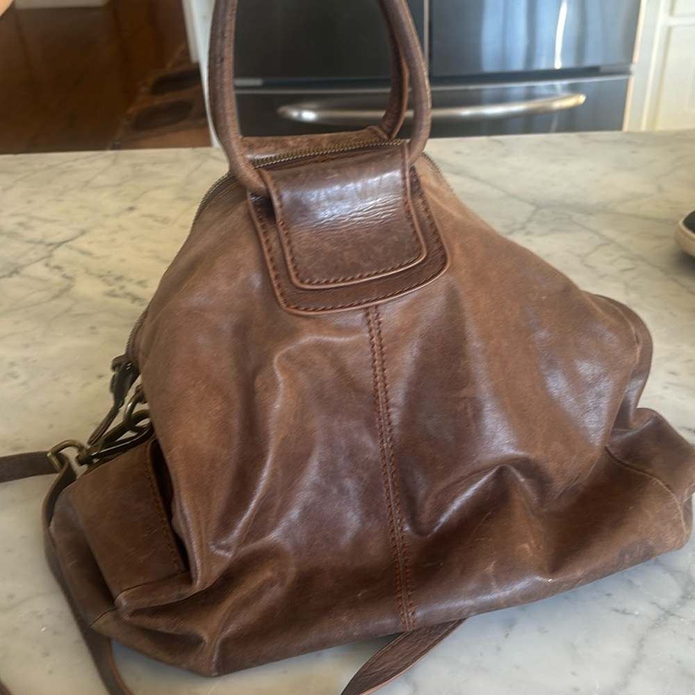 Hobo purse and wallet. Inside zipper on purse needs repair. Won’t zip